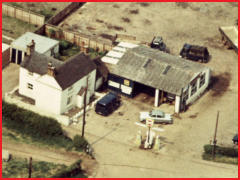 William Bentley&rsquo;s garage premises, with vehicles in the yard.