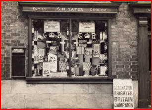 The S. H. Yates grocer shopfront, its window full of packets and tins.